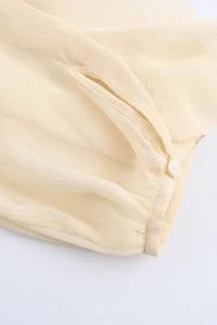 CALLA Ruffle Chiffon Statement Blouse (Cream)
